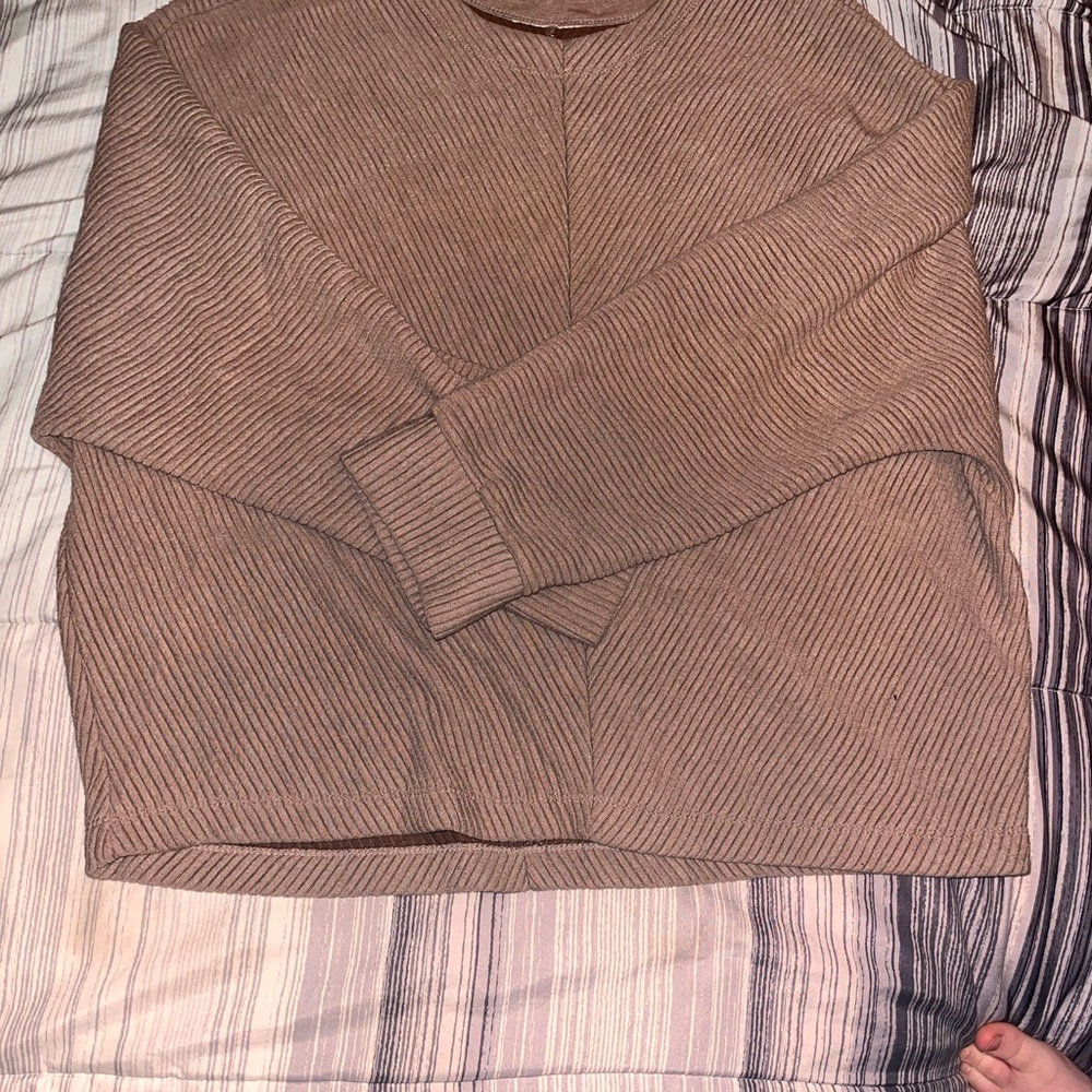 Woman’s pull over sweater can dress up or down cute and warm